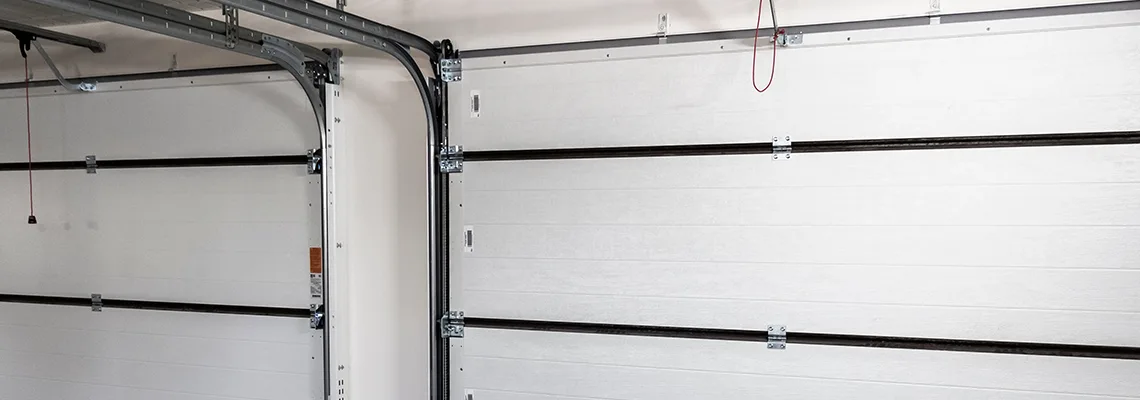 Fix Folding Garage Door Jerking in Ocala, Florida